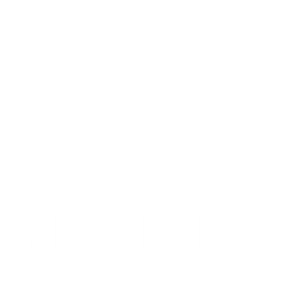 Vit logotyp med transparent bakgrund för The Barber K